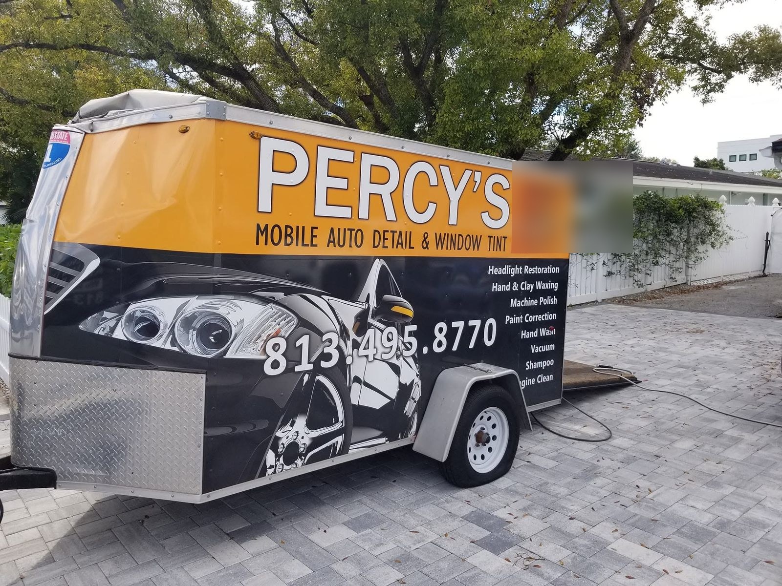 Percy's mobile detail trailer with the full real service menu